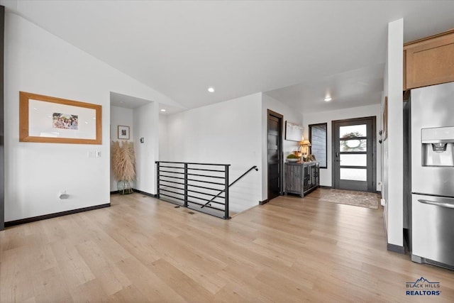 2147 Talisker Ave, Spearfish, SD 57783 - spare room featuring light wood-style flooring, recessed lighting, and vaulted ceiling