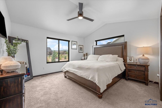 2147 Talisker Ave, Spearfish, SD 57783 - bedroom featuring light colored carpet, vaulted ceiling, and a ceiling fan