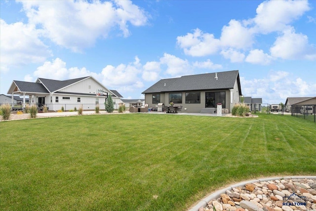 2147 Talisker Ave, Spearfish, SD 57783 - rear view of house with a patio area and roof with shingles