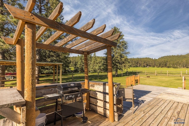 13000 Deer Creek Ln, Rapid City, SD 57702 - wooden terrace with a view of trees, a pergola, and a grill