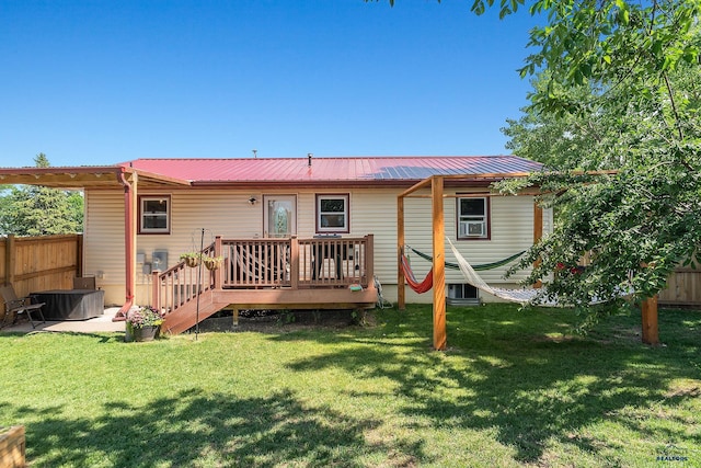 2613 Moose Dr, Sturgis, SD 57785 - back of house featuring a wooden deck and a metal roof