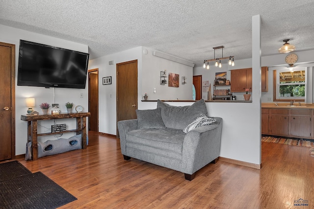 2613 Moose Dr, Sturgis, SD 57785 - living room with wood finished floors and a textured ceiling