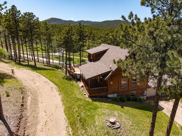 23217 Carbon Loop, Rapid City, SD 57702 - view of subject property with a mountain backdrop and a heavily wooded area