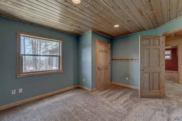 23217 Carbon Loop, Rapid City, SD 57702 - unfurnished bedroom featuring carpet, wooden ceiling, and recessed lighting