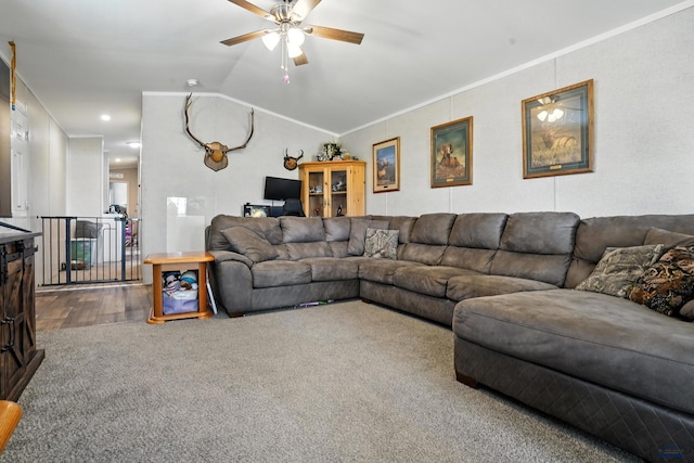 3053 Trailhead Loop, Sturgis, SD 57785 - carpeted living room with a ceiling fan, lofted ceiling, ornamental molding, and wood finished floors