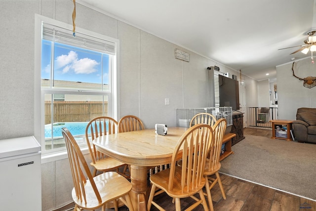 3053 Trailhead Loop, Sturgis, SD 57785 - dining area featuring hardwood / wood-style flooring, ceiling fan, and crown molding