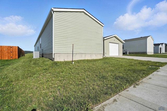 3053 Trailhead Loop, Sturgis, SD 57785 - view of side of property with concrete driveway, a garage, and an outdoor structure