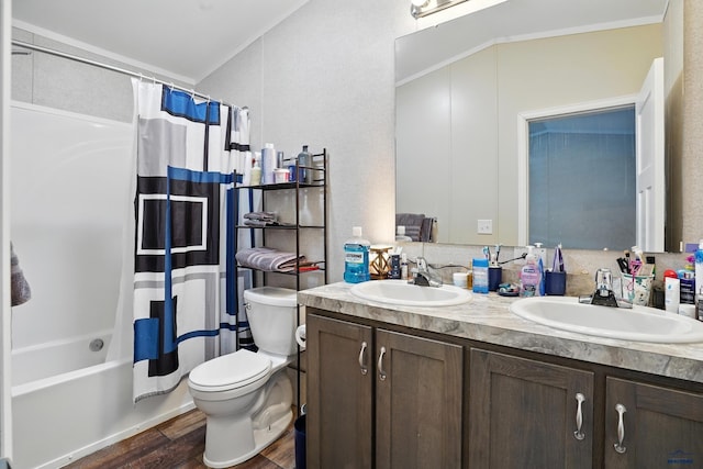 3053 Trailhead Loop, Sturgis, SD 57785 - bathroom with double vanity, wood finished floors, shower / bath combination with curtain, and ornamental molding