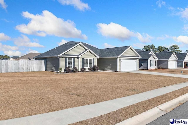 ranch-style home featuring a garage