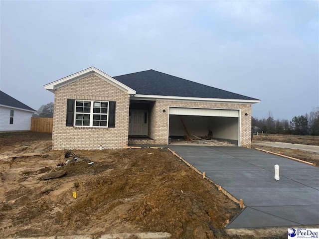 single story home with a garage