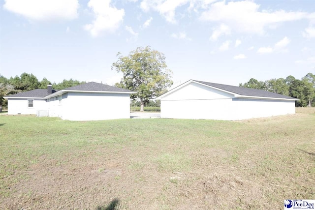 exterior space featuring a yard