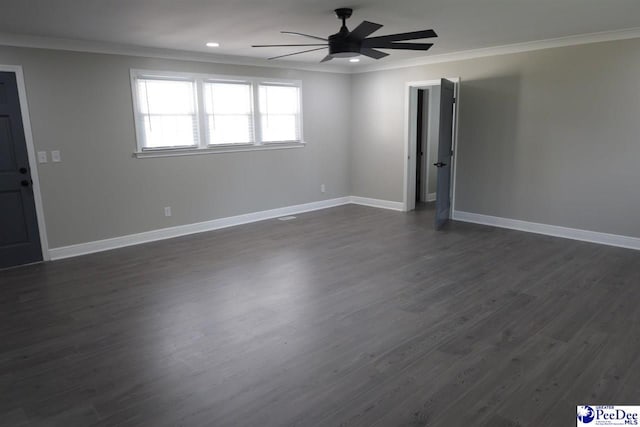 unfurnished room featuring ornamental molding, ceiling fan, and dark hardwood / wood-style flooring