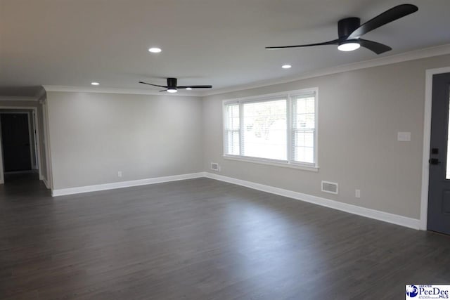 unfurnished room featuring crown molding, dark hardwood / wood-style floors, and ceiling fan