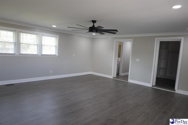 unfurnished room featuring ornamental molding, dark hardwood / wood-style floors, and ceiling fan