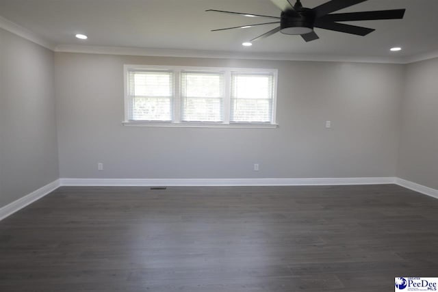 unfurnished room with crown molding, dark hardwood / wood-style floors, and ceiling fan