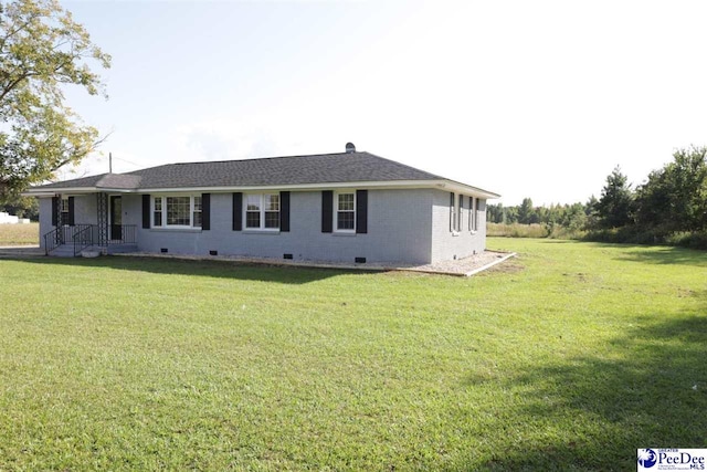 exterior space featuring a front lawn