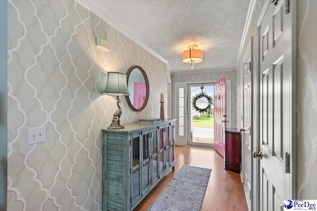 3109 Stillwater Ln, Florence, SC 29501 - foyer with wood finished floors, ornamental molding, and a textured ceiling