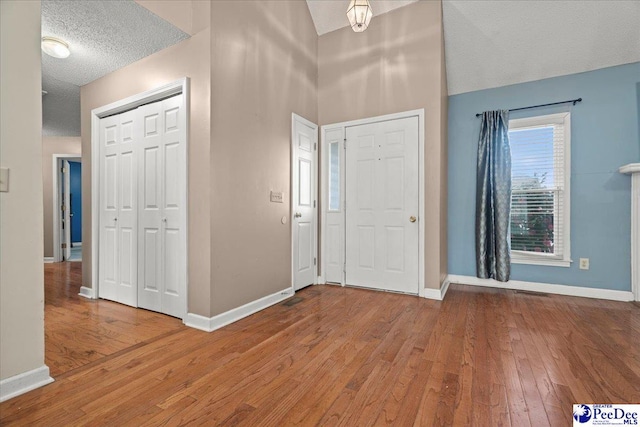 316 Magna Carta Rd, Florence, SC 29501 - foyer entrance featuring hardwood / wood-style flooring, baseboards, and a textured ceiling