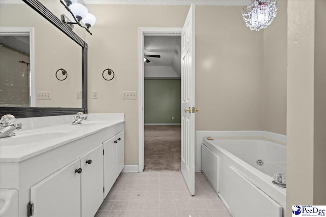316 Magna Carta Rd, Florence, SC 29501 - bathroom featuring double vanity, baseboards, a whirlpool tub, and a sink