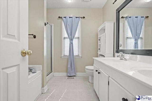 316 Magna Carta Rd, Florence, SC 29501 - full bath with a sink, a textured ceiling, a stall shower, and toilet