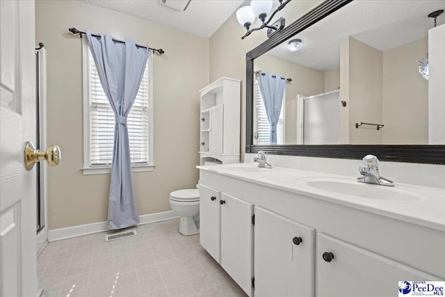 316 Magna Carta Rd, Florence, SC 29501 - full bathroom with a sink, baseboards, a textured ceiling, and a stall shower