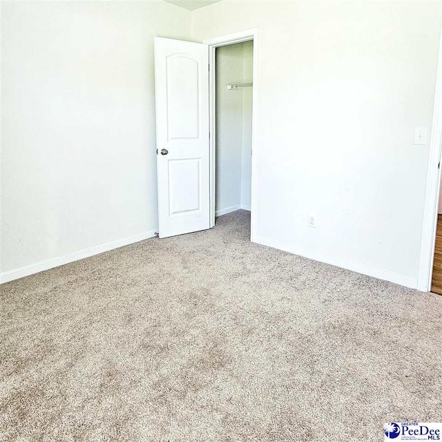 822 Twin Oaks Cir, Lake City, SC 29560 - carpeted empty room featuring baseboards