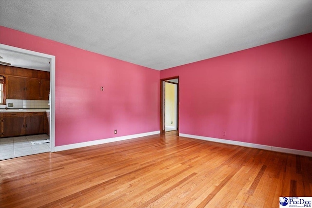 410 N Salem Dr, Florence, SC 29506 - empty room featuring light wood-style flooring and baseboards
