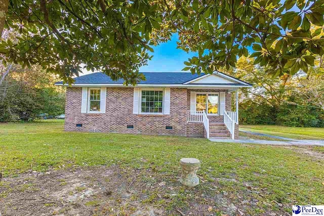 view of front of home with a front yard