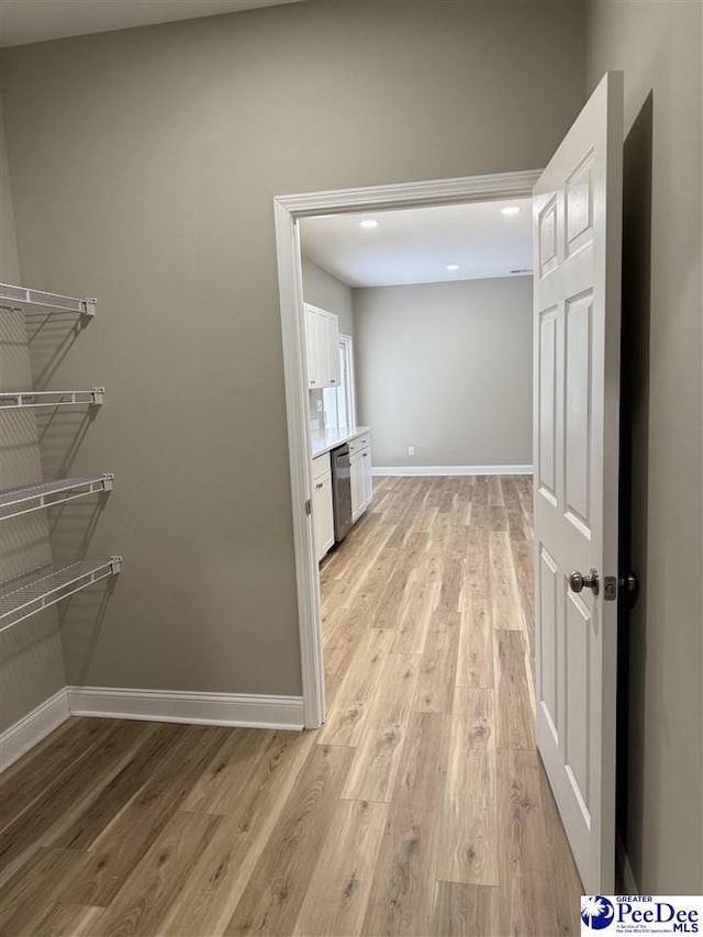 hall featuring light wood-type flooring