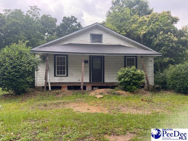 219 Marion St, Cheraw, SC 29520 - view of front of house with a porch
