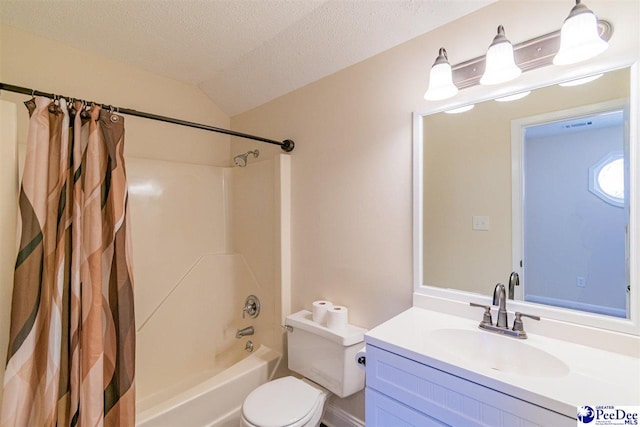 bathroom featuring shower / bath combination with curtain, vaulted ceiling, toilet, vanity, and a textured ceiling