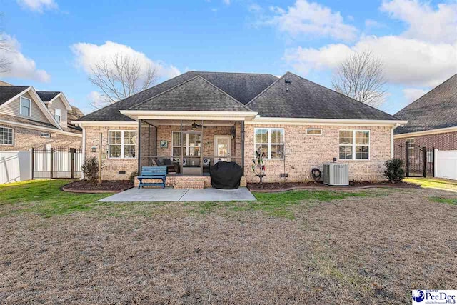 back of house featuring a yard, central AC, a patio, and ceiling fan