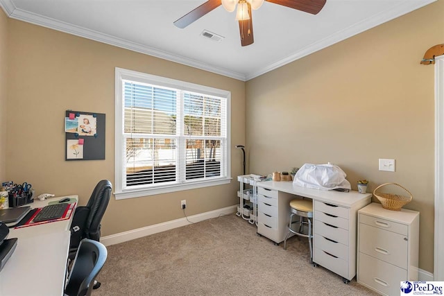 office space featuring crown molding, light carpet, and ceiling fan