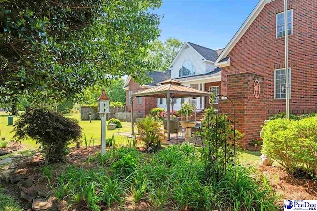 526 Shannon Rd, Marion, SC 29571 - exterior space with a patio, a gazebo, and fence