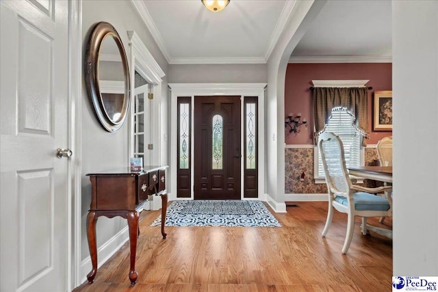 526 Shannon Rd, Marion, SC 29571 - foyer entrance with light wood finished floors, baseboards, and crown molding