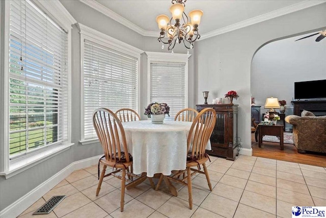 526 Shannon Rd, Marion, SC 29571 - dining room with light tile patterned flooring, a notable chandelier, ornamental molding, and visible vents