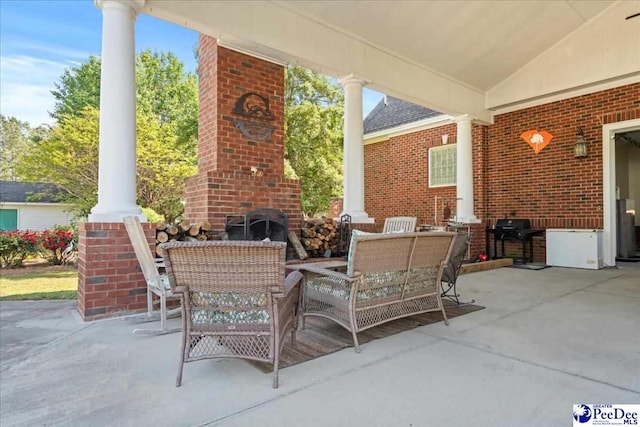 526 Shannon Rd, Marion, SC 29571 - view of patio featuring an outdoor living space with a fireplace and area for grilling