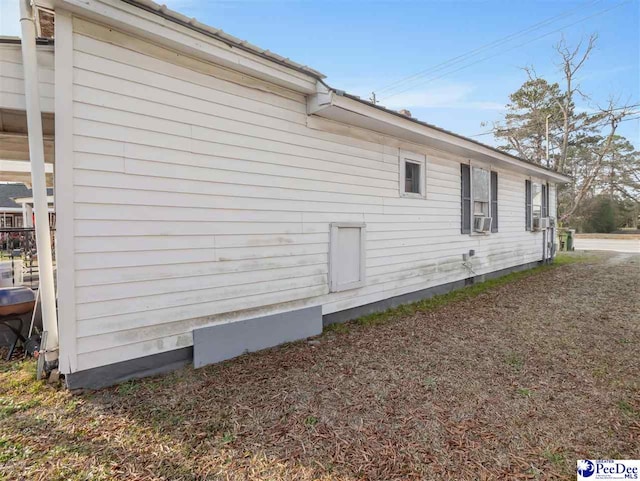 view of home's exterior featuring cooling unit