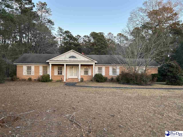 neoclassical / greek revival house with a porch