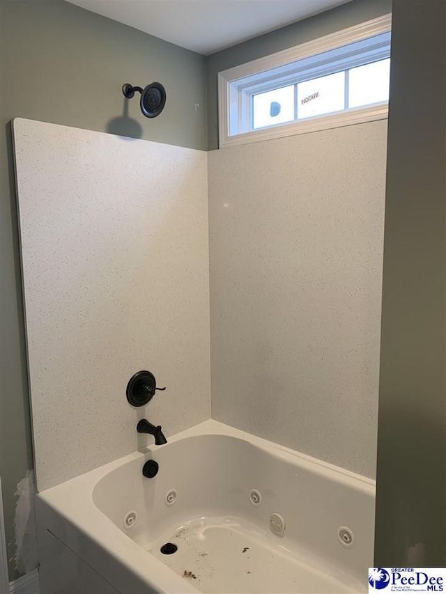 bathroom featuring a combined bath / shower with jetted tub