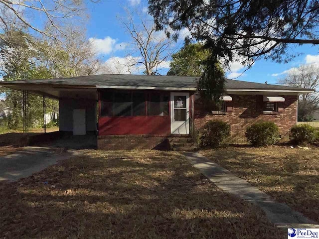 exterior space featuring a carport