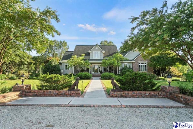 view of cape cod-style house