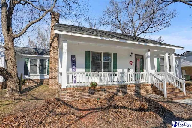 view of front of property with covered porch