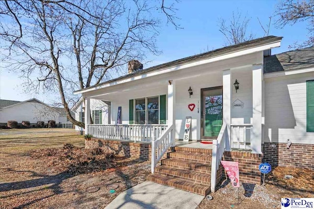 view of front of house with covered porch