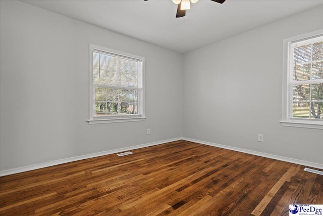 1933 3rd Loop Unit A, Florence, SC 29501 - unfurnished room with ceiling fan, dark wood-style flooring, and baseboards