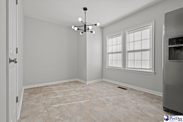 1933 3rd Loop Unit A, Florence, SC 29501 - unfurnished dining area featuring a chandelier and baseboards