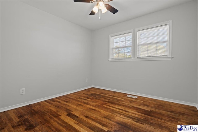 1933 3rd Loop Unit A, Florence, SC 29501 - spare room featuring baseboards, a ceiling fan, and dark wood-type flooring