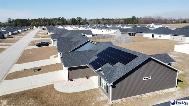 drone / aerial view with a residential view