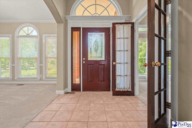 3401 Sussex Ct, Florence, SC 29501 - foyer entrance with light carpet and ornamental molding