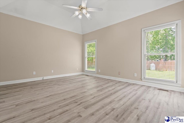 3401 Sussex Ct, Florence, SC 29501 - unfurnished room featuring light wood-style floors, plenty of natural light, ceiling fan, and high vaulted ceiling